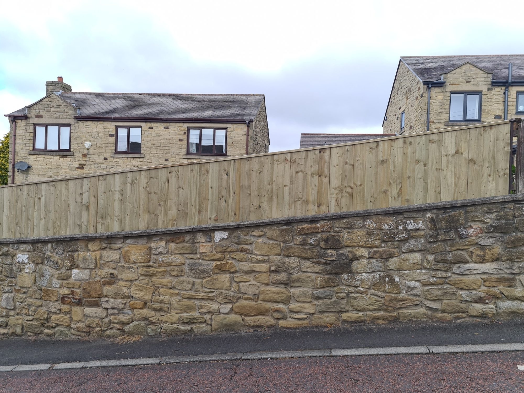 Newly installed fence and matching gate in Washington outdoor space