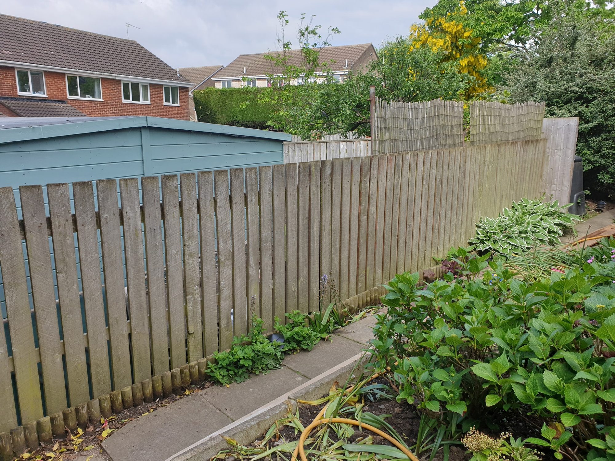 Single garden gate fitted in Sunderland to match fence design